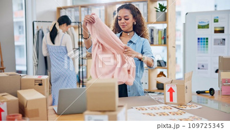 Small business, clothes and a woman with order box or logistics for fashion delivery or online store. Young entrepreneur person or startup company owner for e commerce, parcel or packaging of product Small business, clothes and a woman with order box or logistics for fashion delivery or online store. Young entrepreneur person or startup company owner for e commerce, parcel or packaging of product 109725345