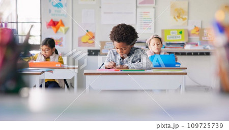 Education, boy and students in a classroom, writing or knowledge with creativity, lessons or notebook. Drawing, children or kids with inspiration, teaching or test with ideas, learning or development Education, boy and students in a classroom, writing or knowledge with creativity, lessons or notebook. Drawing, children or kids with inspiration, teaching or test with ideas, learning or development 109725739