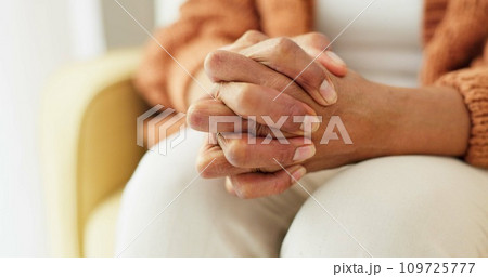 Hands, stress and senior woman on a sofa with anxiety, fear or grief, dementia or scared in her home. Stress, worry and nervous elderly female in a living room with Alzheimer, arthritis or depression Hands, stress and senior woman on a sofa with anxiety, fear or grief, dementia or scared in her home. Stress, worry and nervous elderly female in a living room with Alzheimer, arthritis or depression 109725777