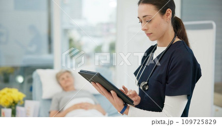 Nurse, checkup and tablet for results at hospital with patient for healthcare or consultation. Medical, expert and service with tech for diagnosis with medical treatment at clinic for help or advice. 109725829