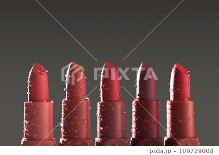 Red lipsticks with water drops on a dark background. Red lipsticks with water drops on a dark background. 109729008