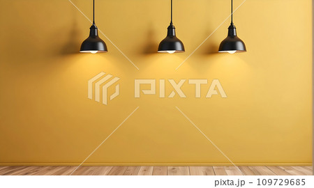 Simple lamp hangs on yellow wall and illuminates it Simple lamp hangs on yellow wall and illuminates it 109729685