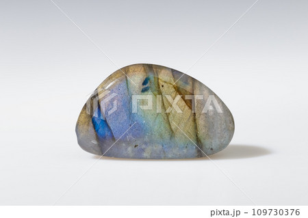 Polished Labradorite Mineral Gem Stone on Grey 109730376