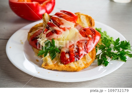 hot sandwich of fried toast bread with baked peppers and cheese hot sandwich of fried toast bread with baked peppers and cheese 109732179