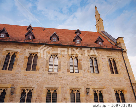 spring trip to Europe. Travel and German sightseeing locations. scenic view to facade of old historic houses somewhere in Erfurt city, Traditional half-timbered houses makes cozy and fairy tail mood spring trip to Europe. Travel and German sightseeing locations. scenic view to facade of old historic houses somewhere in Erfurt city, Traditional half-timbered houses makes cozy and fairy tail mood 109733592