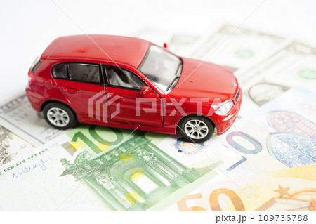 Bangkok, Thailand November 18, 2023 Car on banknote money, buying or insurance concept. 109736788