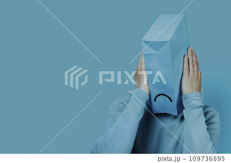 man with a blue bag with a sad face in his head man with a blue bag with a sad face in his head 109736895
