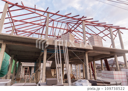 construction residential new house in progress at building site construction residential new house in progress at building site 109738522