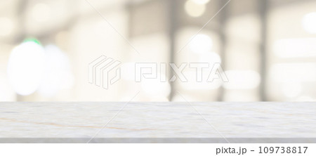 marble table top with blurred abstract cafe restaurant interior background marble table top with blurred abstract cafe restaurant interior background 109738817