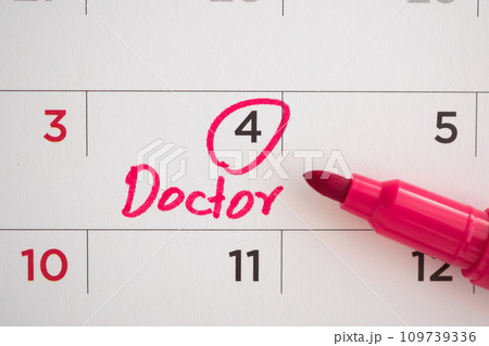 important doctor appointment schedule write on white calendar page date close up 109739336