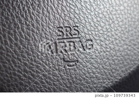 Safety airbag sign on car steering wheel with horn icon 109739343