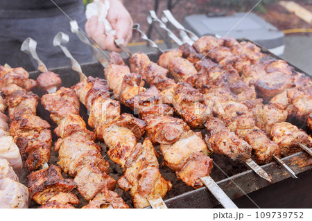 Kebabs cooked outdoors with skewers hot grills in traditional Turkish style 109739752