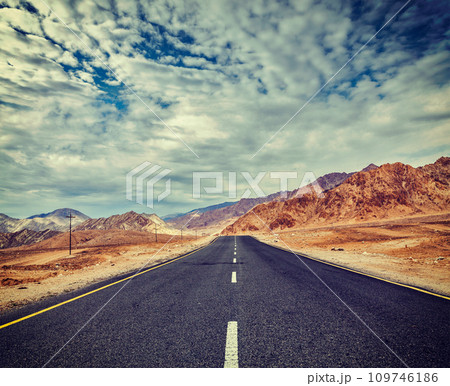 Road in Himalayas with mountains Road in Himalayas with mountains 109746186