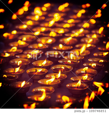 Burning candles in Buddhist temple, McLeod Ganj 109746851