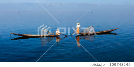 Traditional Burmese fishermen at Inle lake Traditional Burmese fishermen at Inle lake 109748246