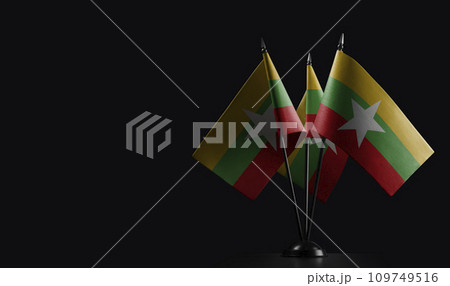 Small national flags of the Myanmar on a black background 109749516