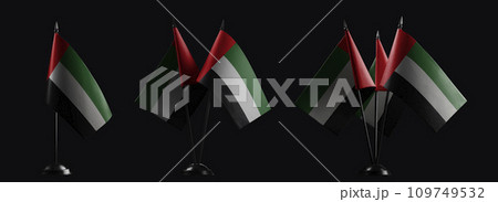Small national flags of the Arab Emirates on a black background 109749532