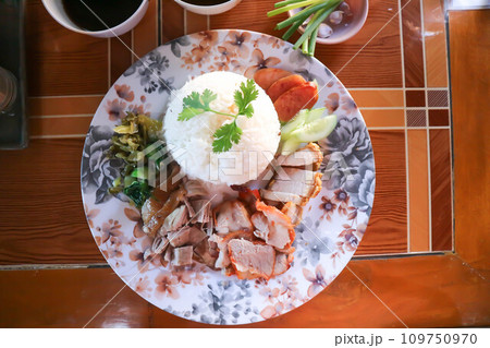 stewed pork ,pork with rice or rice with stew pork and fried pork 109750970