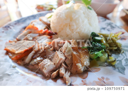 stewed pork ,pork with rice or rice with stew pork and fried pork 109750971