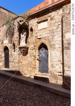 Old medieval street in the historical part of Rhodes. 109751670