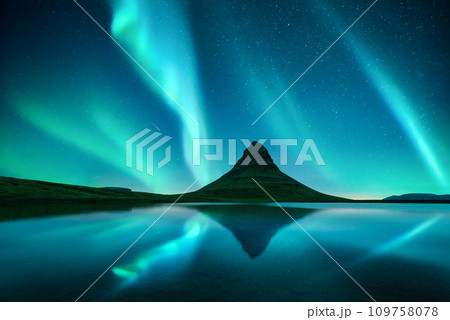 Reflection of Kirkjufell mountain and Northern lights Reflection of Kirkjufell mountain and Northern lights 109758078
