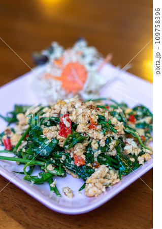Fried gurmar leaf with egg Fried gurmar leaf with egg 109758396
