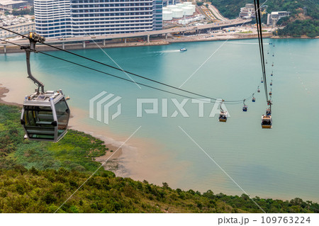 Ngong Ping bicable gondola lift on Lantau Island in Hong Kong, China. Ngong Ping bicable gondola lift on Lantau Island in Hong Kong, China. 109763224