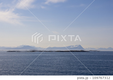 Enchanting summer vista aboard ferry to Lofoten Island, Norway, reveals tranquil North Sea 109767312