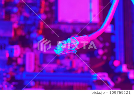 Modern technology network cable in neon light. 109769521