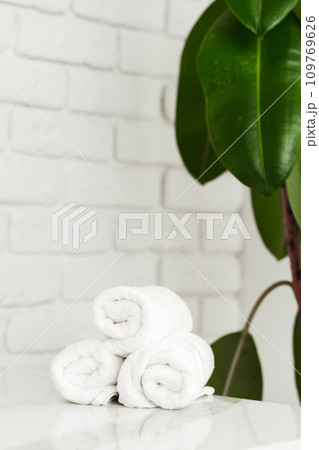 Stack of white towels in the bathroom Stack of white towels in the bathroom 109769626