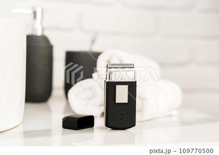 Electric shaver for men in a bathroom close up 109770500