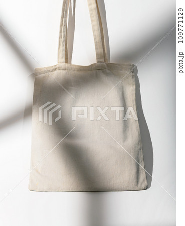 Eco textile tote bag. Recycled cotton fabric shopper mock up Eco textile tote bag. Recycled cotton fabric shopper mock up 109771129