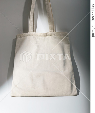 Eco tote bag in daylight. Recycled linen cotton textile shopper mockup 109771135