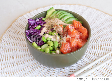 poke bowl with salmon on the light table poke bowl with salmon on the light table 109772446