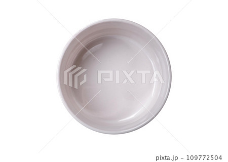 Beautiful empty white ceramic gravy boat on a textured concrete background Beautiful empty white ceramic gravy boat on a textured concrete background 109772504