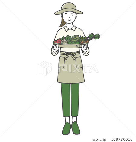 籠いっぱいの野菜を持った女性 109780016