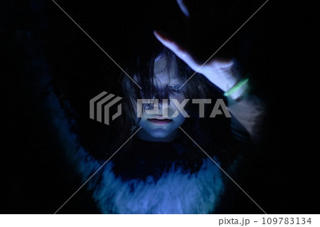 A sad teenage girl behind glass with her problems in depression. Close-up portrait. The concept of caring for children and timely assistance 109783134