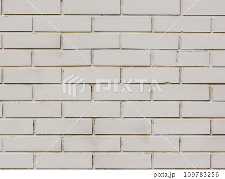 Close-up shot of a grey brick wall. 109783256