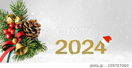 New Year background with golden numbers 2024 and winter composition 109787060