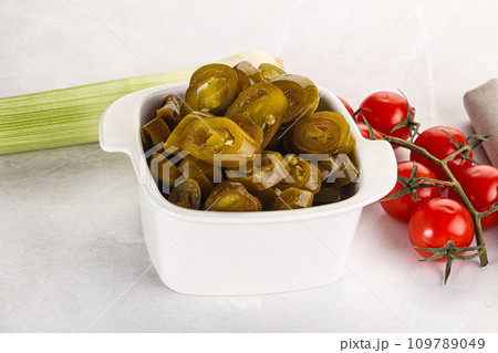 Sliced canned jalapeno pepper 109789049