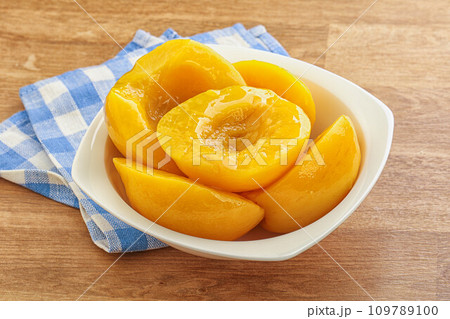 Sweet canned peaches with syrope 109789100