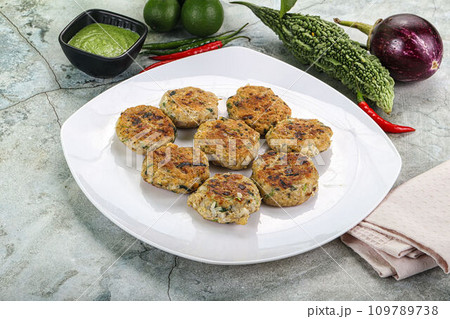 Indian style - chicken kebab with herbs Indian style - chicken kebab with herbs 109789738