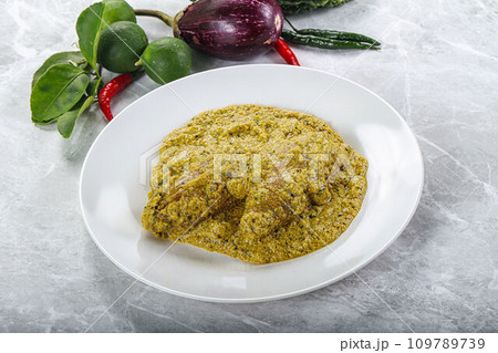 Indian cuisine - pork masala sauce 109789739