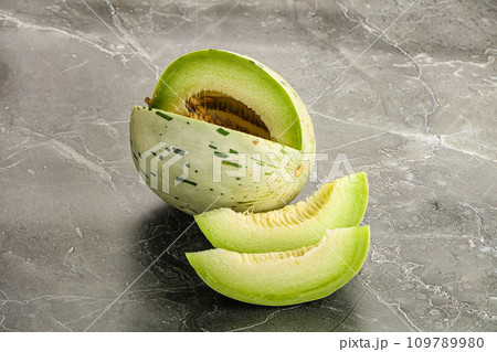 Ripe sweet and juicy dalmatian melon 109789980