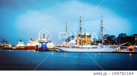 Vessels docked in harbor in the evening, Bergen, Norway Vessels docked in harbor in the evening, Bergen, Norway 109792164