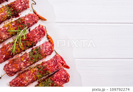 Raw kebab with spices Raw kebab with spices 109792274