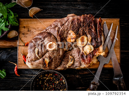 Grilled meat on a table Grilled meat on a table 109792354