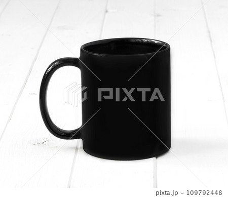 black cup on a white table black cup on a white table 109792448