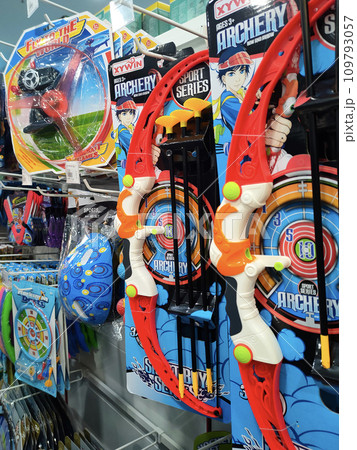 JOHOR, MALAYSIA -JULY 24, 2022: Children's toys are hung and displayed for sale. Toys are made in colorful colors and various designs to attract children's interest. Has a price tag. JOHOR, MALAYSIA -JULY 24, 2022: Children's toys are hung and displayed for sale. Toys are made in colorful colors and various designs to attract children's interest. Has a price tag. 109793057