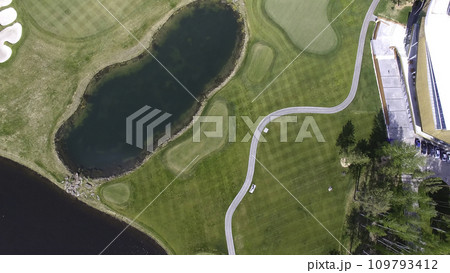 Golf course on a Sunny day, an excellent Golf club with ponds and green grass, view from the sky Golf course on a Sunny day, an excellent Golf club with ponds and green grass, view from the sky 109793412